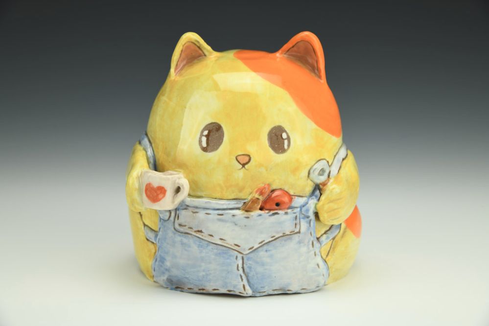 Potter Cat Figurine