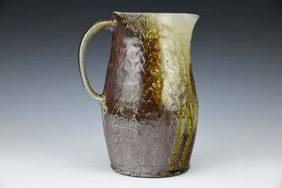 Iron Pitcher with Leafy Pattern