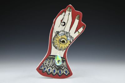Hand with Golden Eye and Crystal